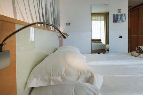 Letto o letti in una camera di Wellness Hotel Casa Barca (Adult Only)