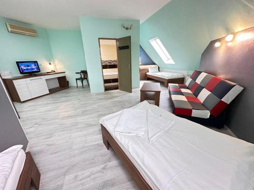 Katil atau katil-katil dalam bilik di Hotel N