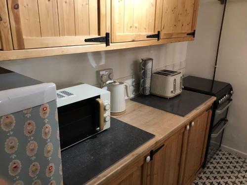 A kitchen or kitchenette at Coronation Place