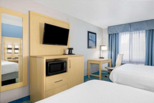 Ένα ή περισσότερα κρεβάτια σε δωμάτιο στο Days Inn by Wyndham Springville