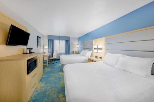 Ένα ή περισσότερα κρεβάτια σε δωμάτιο στο Days Inn by Wyndham Springville