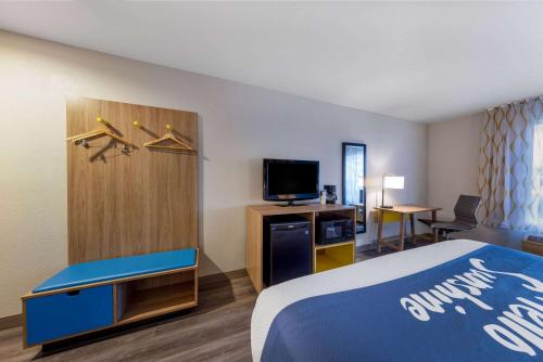 Cama o camas de una habitación en Days Inn by Wyndham Lathrop