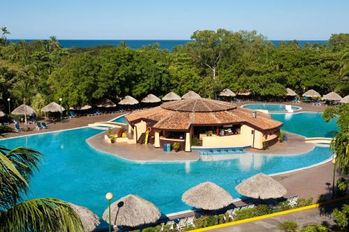 an image of a resort swimming pool with a resort at Barceló Montelimar All Inclusive in Montelimar