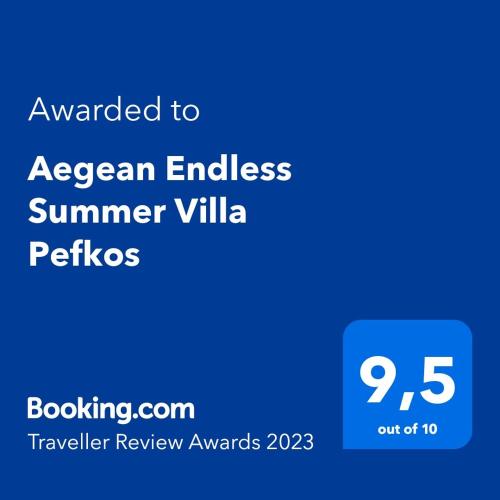 a blue sign with the text awarded to an american endless summer villa at Aegean Endless Summer Villa Pefkos in Pefki Rhodes