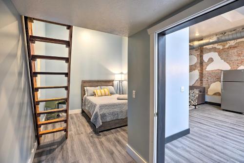 a bedroom with a bed and a bunk room at Cherokee Vacation Rental - On Main Street! in Cherokee