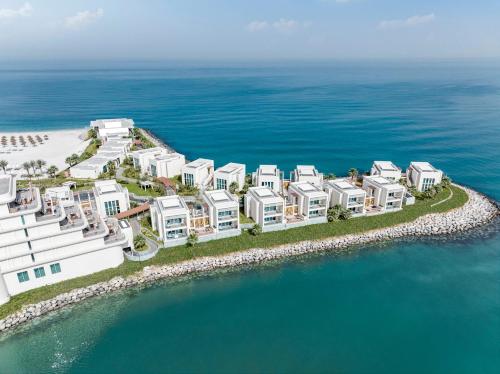 an aerial view of a resort on the ocean at InterContinental Ras Al Khaimah Mina Al Arab Resort & Spa by IHG in Ras al Khaimah