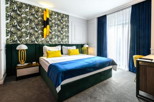 Postel nebo postele na pokoji v ubytování Hotel Del Corso