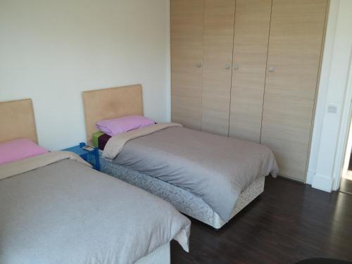 The Kapitani Residenceにあるベッド