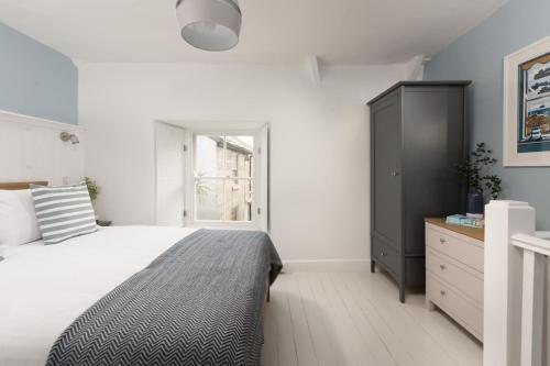 Ένα ή περισσότερα κρεβάτια σε δωμάτιο στο Newlyn Nookery