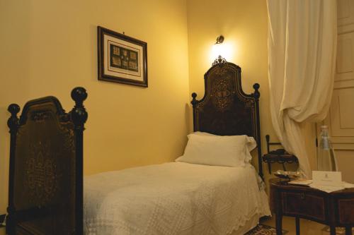 Ένα ή περισσότερα κρεβάτια σε δωμάτιο στο Casa Turchetti