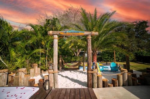 a playground with a pool and a pool table and a pool table at Heated pool in a Precious House close to Zoo Parks and Arts in Cutler Bay