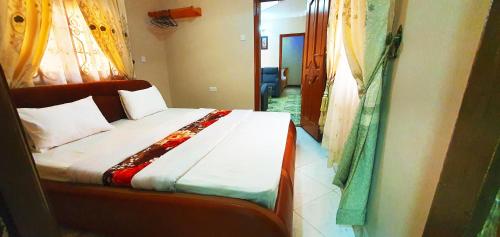 Ένα ή περισσότερα κρεβάτια σε δωμάτιο στο Goodhope 3-Bedroom Vacation Rental