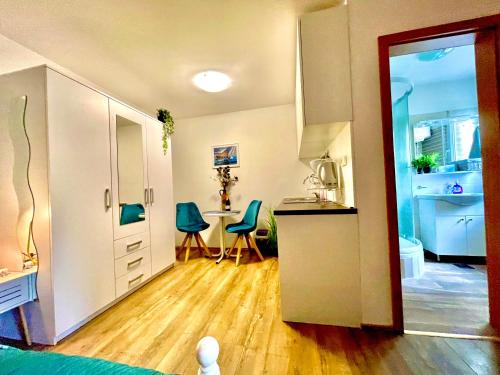 Gambar di galeri bagi Lovely flower small house for two by the sea di Jezera
