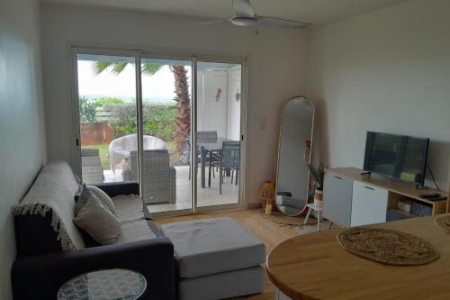 TV i/ili zabavni centar u objektu Appartement Seaside