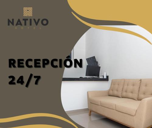 a living room with a couch and a laptop at hotel nativo in Valledupar