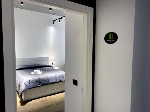 Postel nebo postele na pokoji v ubytování Business Home Via Isonzo B&B