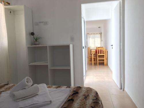 Ένα ή περισσότερα κρεβάτια σε δωμάτιο στο Brisas de San Rafael