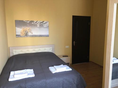 מיטה או מיטות בחדר ב-Hotel Nikea