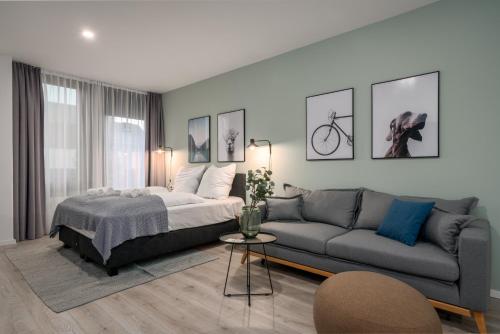 Кровать или кровати в номере BRIGHT Lippstadt Klusetor
