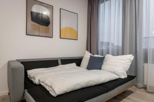 Кровать или кровати в номере BRIGHT Lippstadt Klusetor