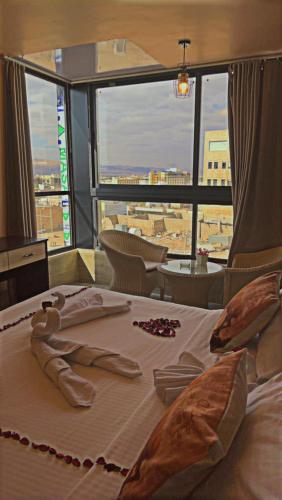 Katil atau katil-katil dalam bilik di Al-Naher Al-Khaled Hotel