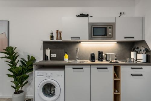 Кухня или мини-кухня в BRIGHT Lippstadt Klusetor
