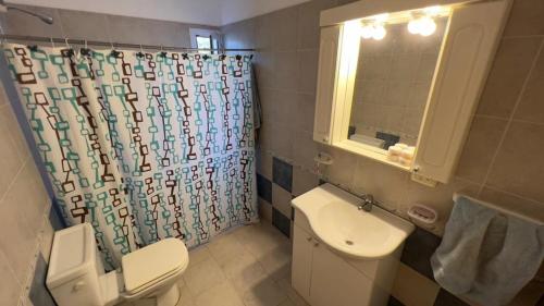 Kylpyhuone majoituspaikassa Terracita Suite