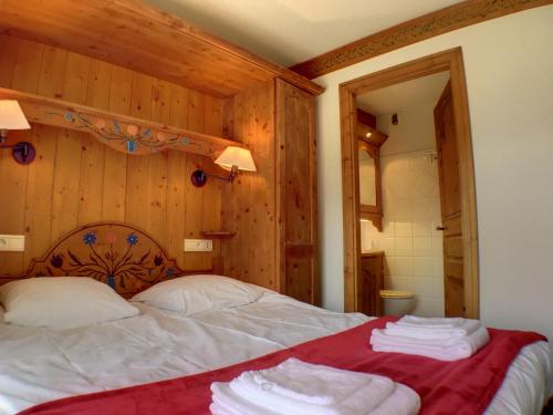 Ein Bett oder Betten in einem Zimmer der Unterkunft Cristal d'Argentière - Mont-Blanc