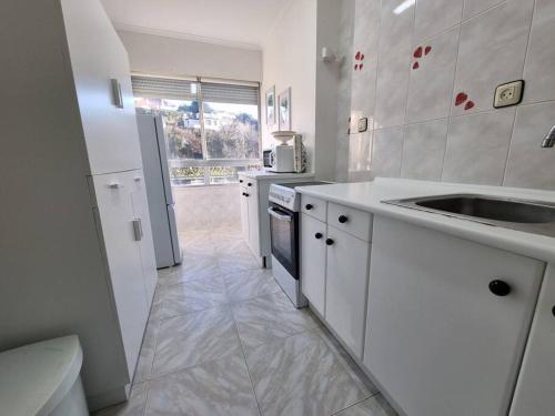 Kuchyň nebo kuchyňský kout v ubytování C09A01 Apartamento Somo