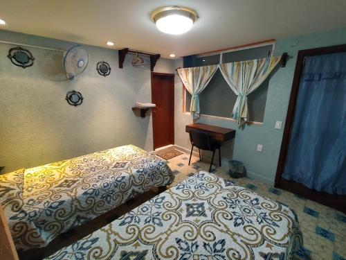 Tempat tidur dalam kamar di Casa Azul Aragon