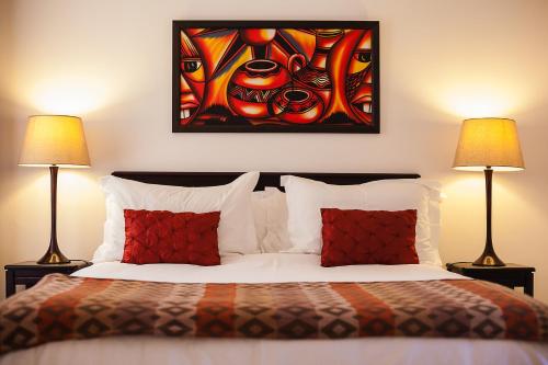 Säng eller sängar i ett rum på Newton Sands Guesthouse