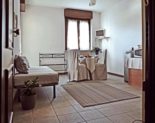 A seating area at Apartment Il Fiore