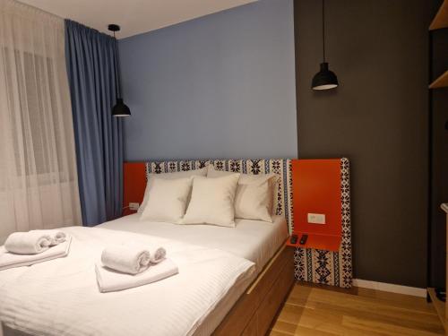 Ένα ή περισσότερα κρεβάτια σε δωμάτιο στο Apartman Orange - Snjezna Dolina