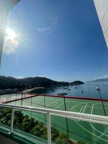 a tennis court on the balcony of a building at Angra inn, Angra dos Reis in Angra dos Reis
