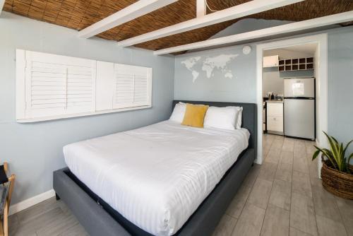 a bedroom with a large bed in a room at Pacific Bungalow in Oceanside with Backyard & Tiny House in Oceanside