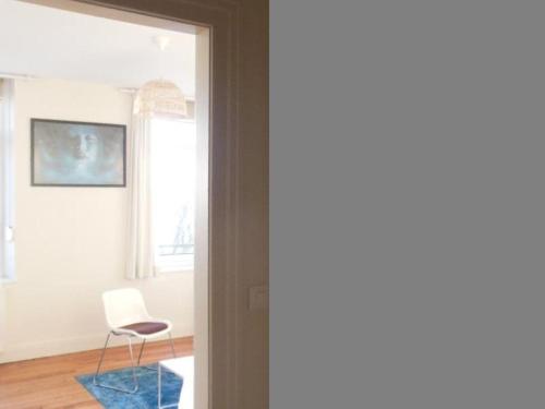 Televízia a/alebo spoločenská miestnosť v ubytovaní Appartement face à la plage avec WiFi, terrasse et équipements complets - FR-1-376-112