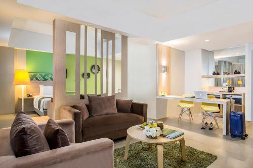 Χώρος καθιστικού στο KHAS Pekanbaru Hotel