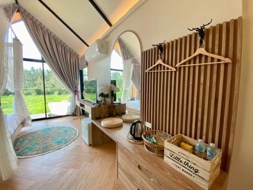 Photo de la galerie de l'établissement Baan Nai Baan Nok Resort, à Nakhon Nayok