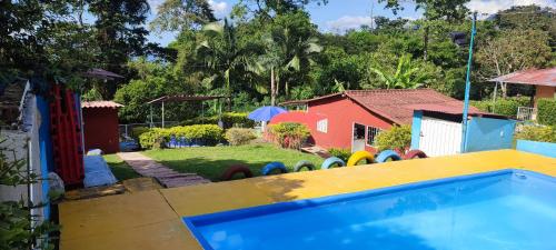 Het zwembad bij of vlak bij Quinta Villa Sarita Melgar Tolima