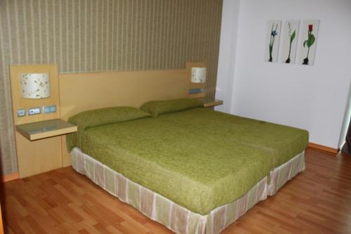 Postel nebo postele na pokoji v ubytování Valcarce Ferrol