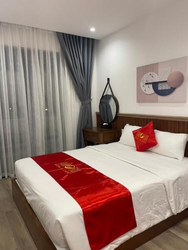 Postel nebo postele na pokoji v ubytování Amorii Hotel