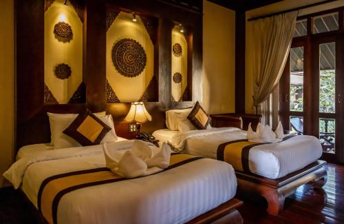 Katil atau katil-katil dalam bilik di Sada Hotel