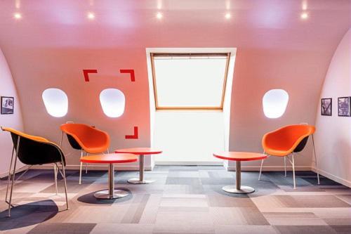 Χώρος καθιστικού στο ibis Styles Paris Velizy