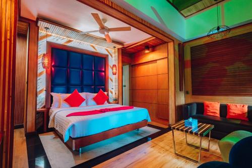 En eller flere senge i et værelse på Millennium Island Residence