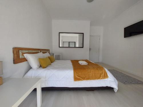 Postel nebo postele na pokoji v ubytování Aveiro Home