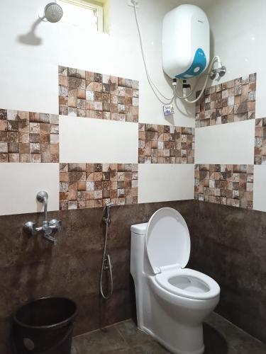 Ένα μπάνιο στο Leo's Residency Coorg