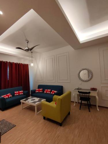 Area tempat duduk di Cameron Lovely Cottage 3 Rooms