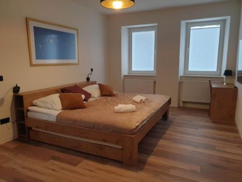 Posteľ alebo postele v izbe v ubytovaní Apartament Zimowiec