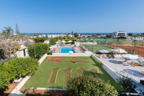 an aerial view of a park with a playground at Anastasia Hotel Stalis in Stalís