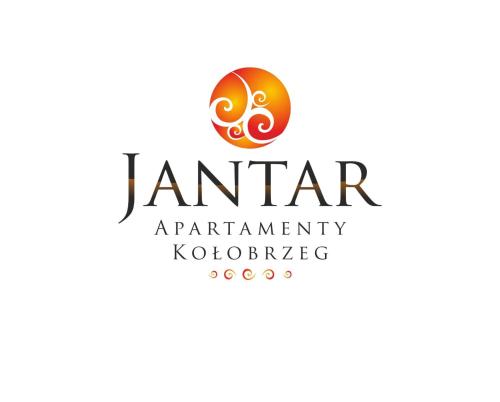a logo for anarma restaurant kodaikanal at Lighthouse Luxury Penthouse - Jantar Apartamenty in Mrzeżyno